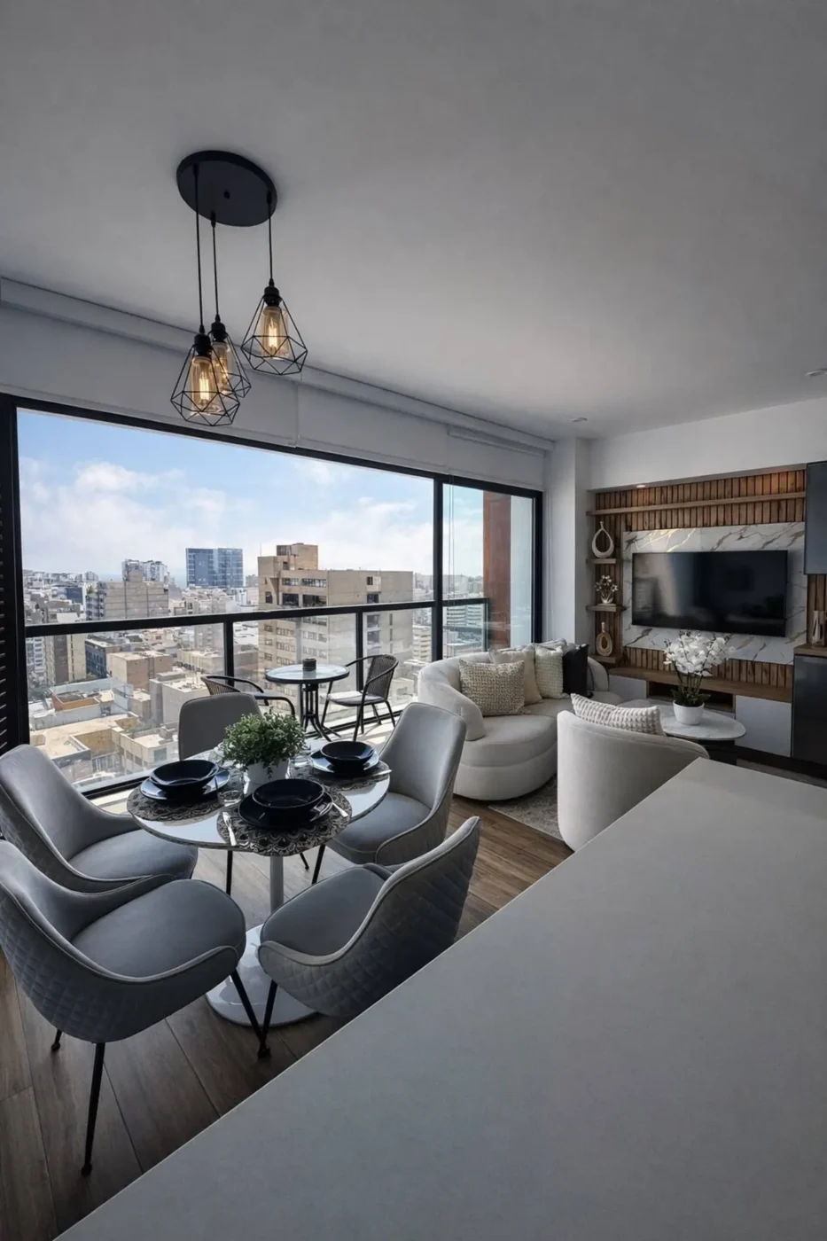 Dining table by floor-to-ceiling windows